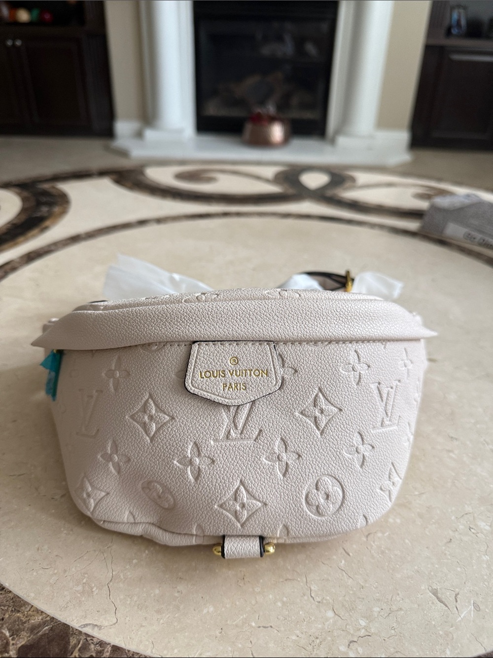 New never used Monogram Cream Embossed Crossbody. Very stylish